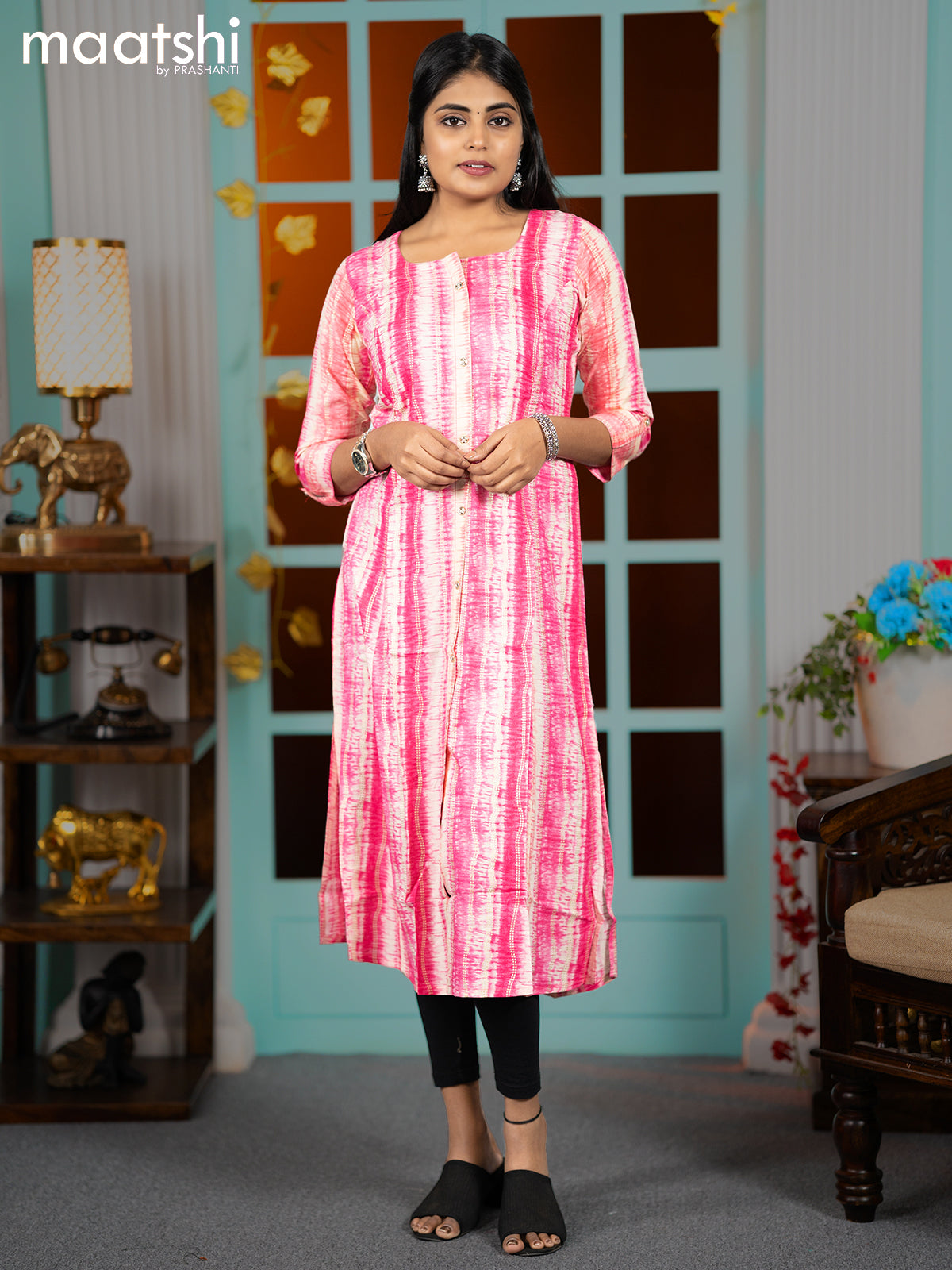 Rayon readymade A-line kurti pink and beige with allover batik prints & simple neck pattern without pant