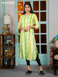 Rayon readymade A-line kurti green and lime green with allover batik prints & simple neck pattern without pant