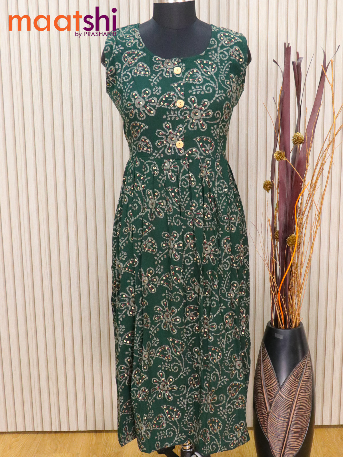 Soft cotton readymade umbrella kurti dark green with allover batik prints & sleeveless without pant