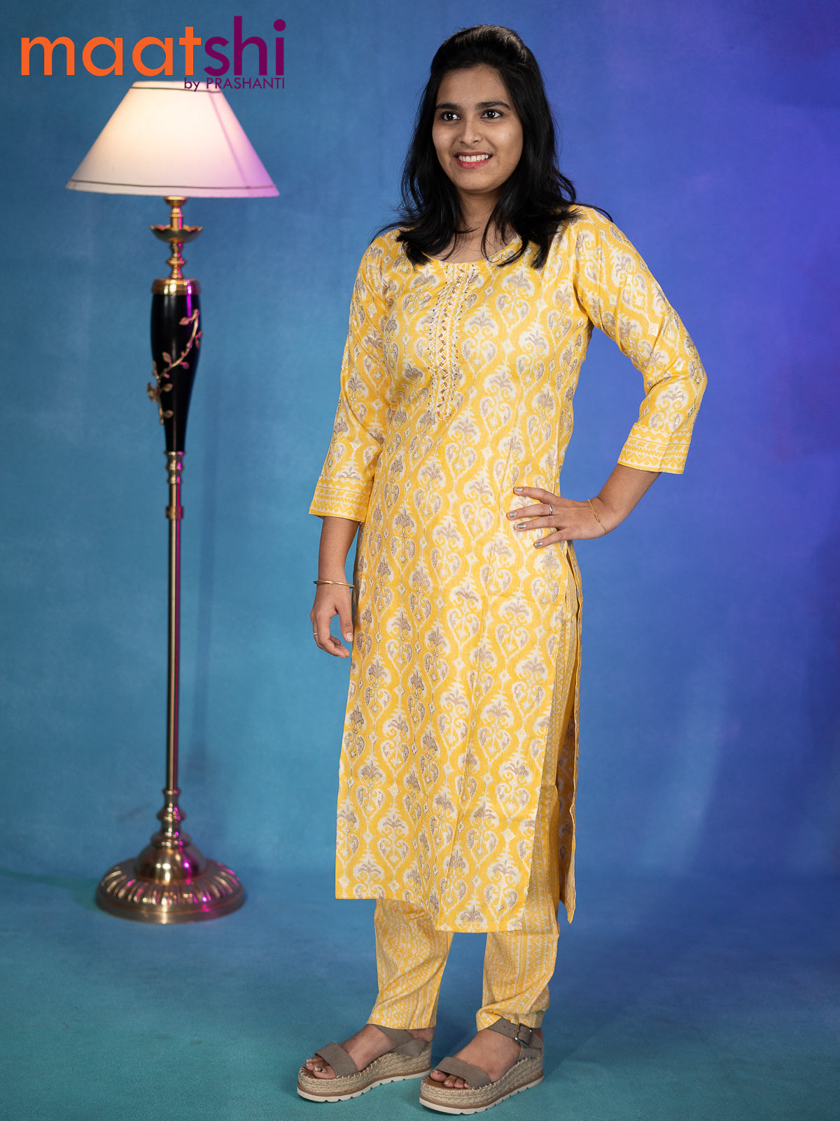 Satin cotton readymade kurti yellow with allover ikat prints & beaded embroidery neck pattern and straight cut pant