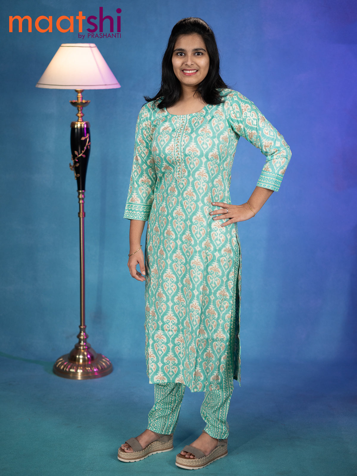 Satin cotton readymade kurti teal blue and cream with allover ikat prints & beaded embroidery neck pattern and straight cut pant