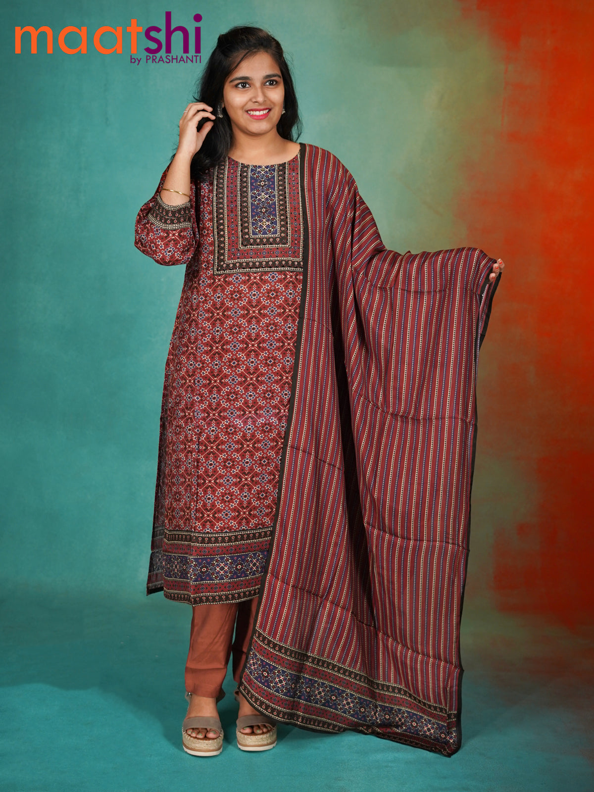 Muslin readymade kurti set maroon with allover ikat prints & stone work neck pattern and straight cut pant & dupatta