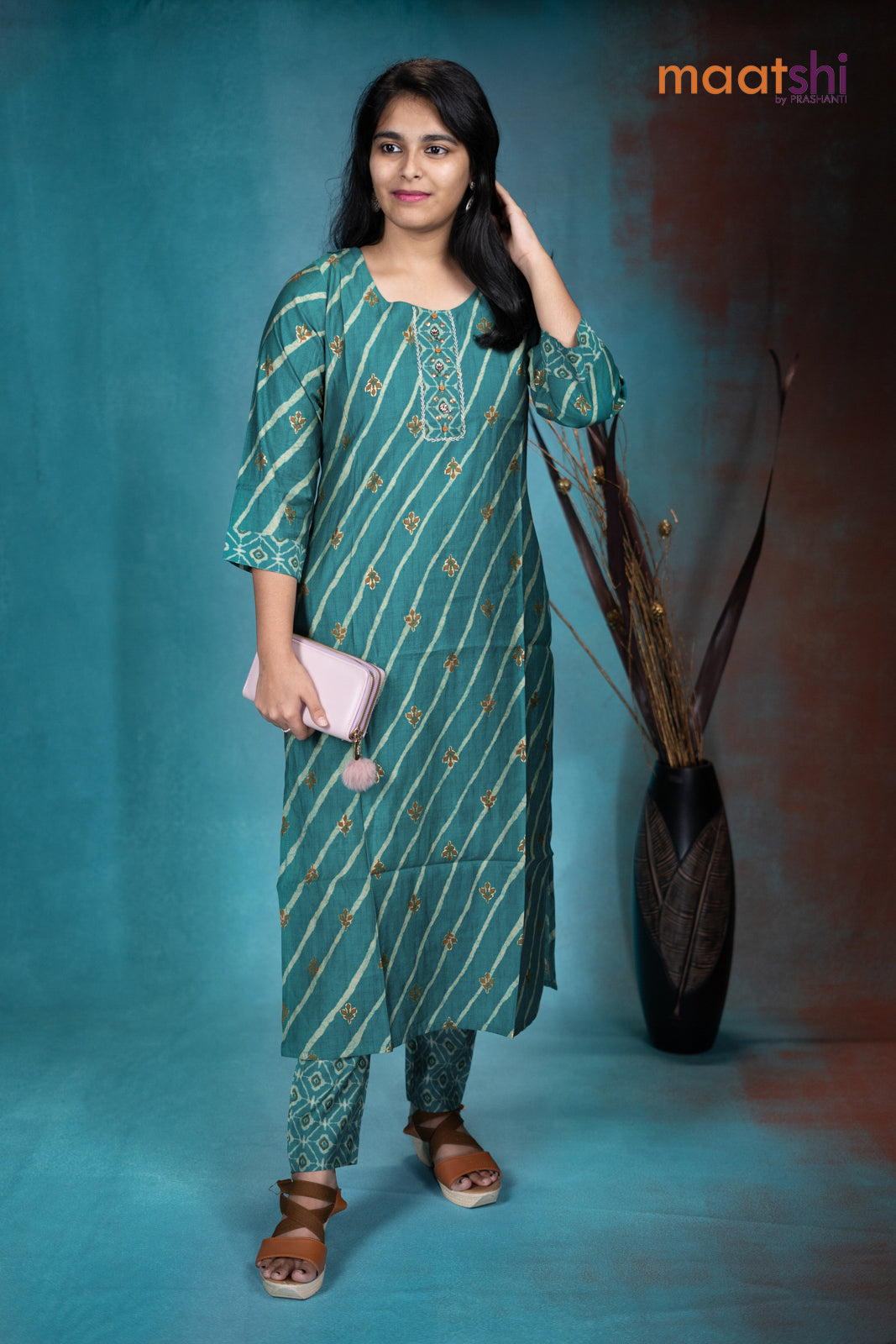 Muslin readymade kurti teal green with allover prints & simple neck pattern and straight cut pant