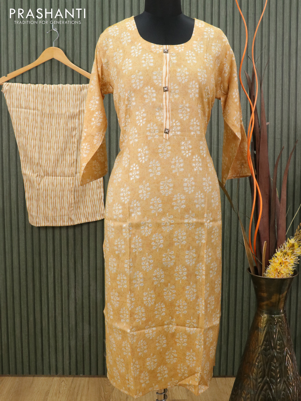 Slub cotton readymade kurti yellow shade and beige with allover floral butta prints and straight cut pant