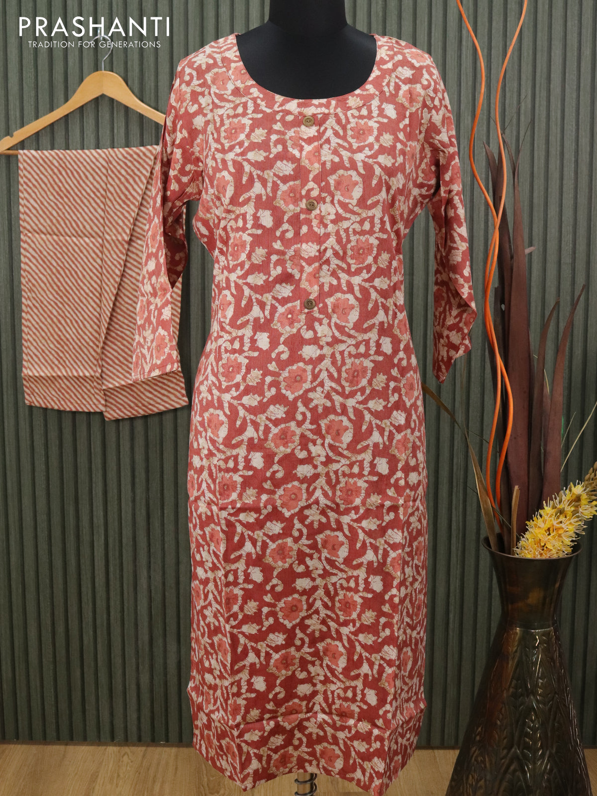 Slub cotton readymade kurti rust shade and beige with allover batik prints and straight cut pant