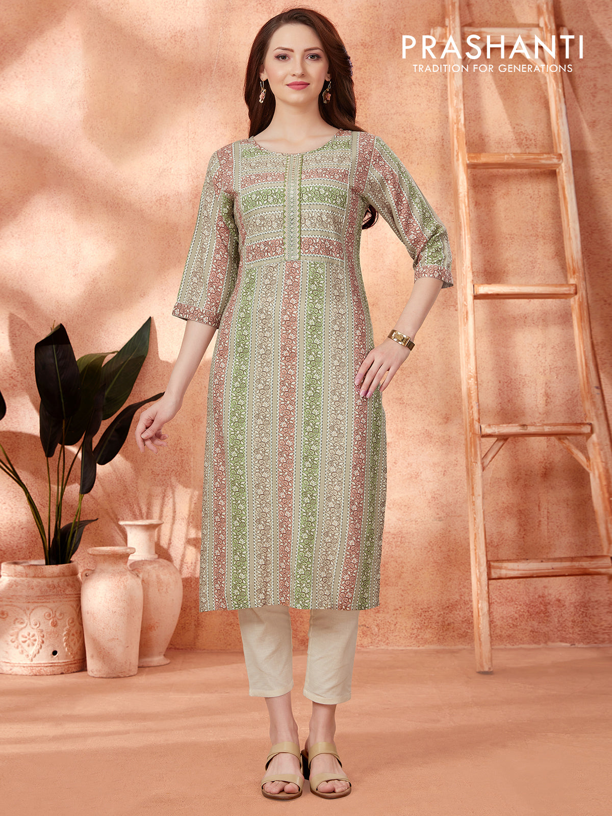 Cotton readymade kurti pastel green with allover prints & lace work neck pattern without pant