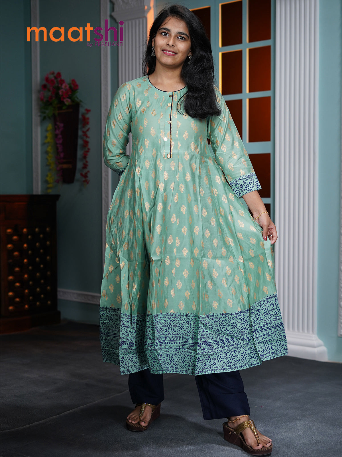 Rayon readymade umbrella kurti pastel green with allover prints without pant