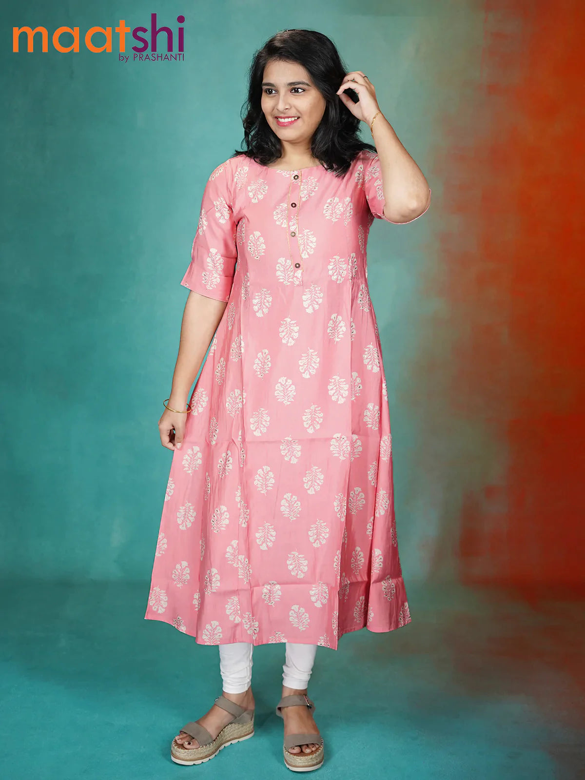 Muslin readymade kurti baby pink with allover floral prints & simple patch work neck pattern without pant