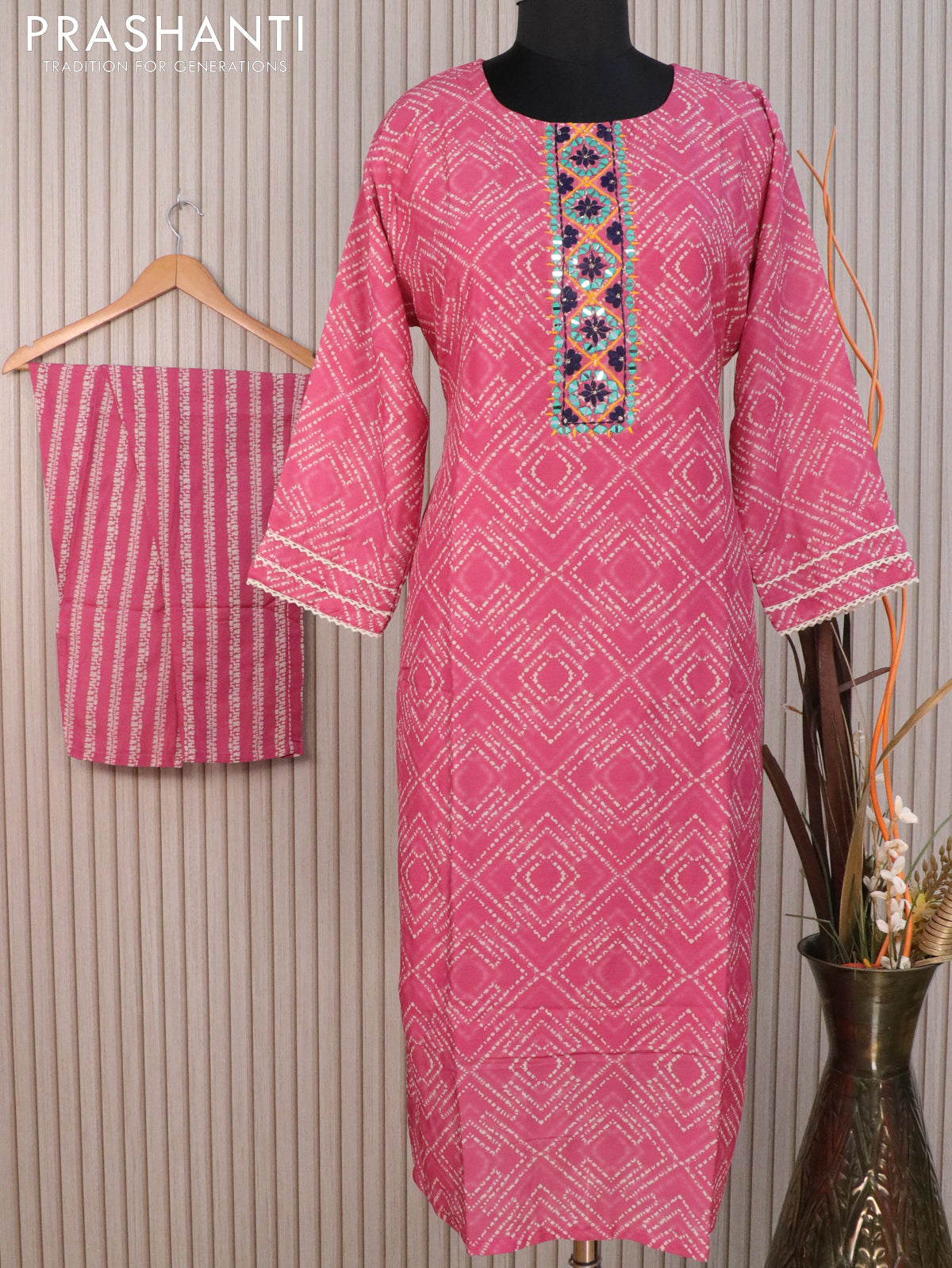 Muslin readymade kurti pink with allover prints & mirror work neck pattern and straight cut pant