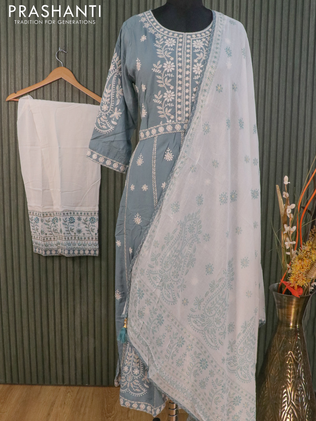 Rayon readymade umbrella kurti pastel blue shade and off white with allover embroidery neck pattern and straight cut pant & dupatta