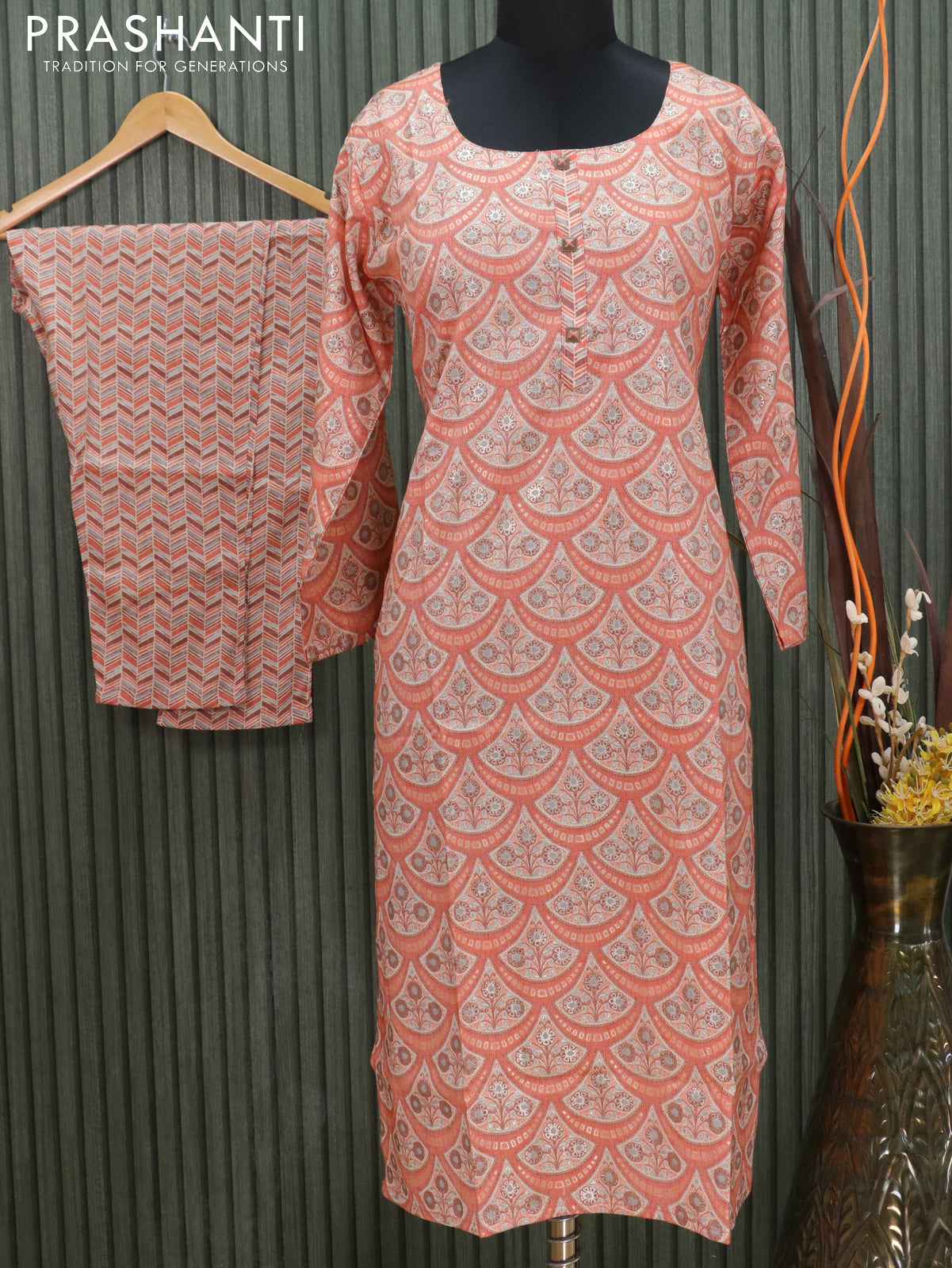 Slub cotton readymade kurti pale orange with allover prints and stright cut pant