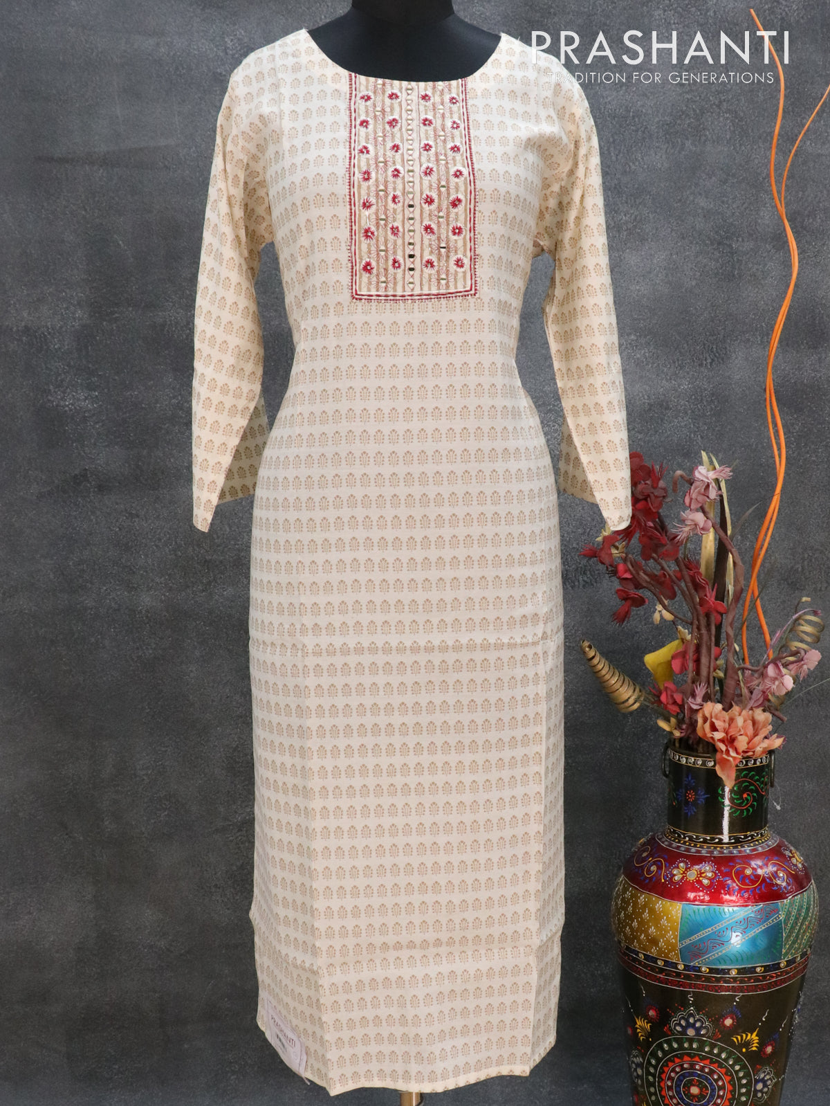 Modal readymade kurti cream with simple embroided mirror neck pattern and straight cut pant